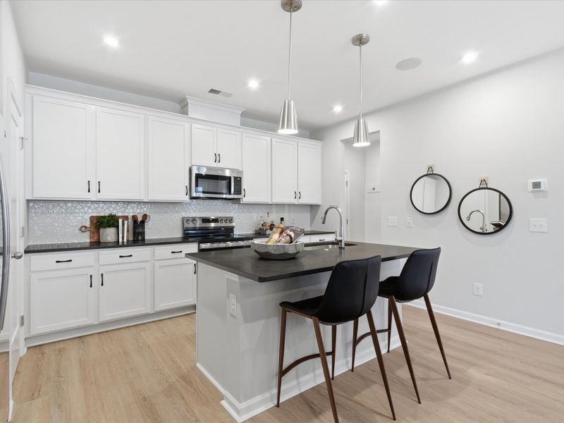 Representative furnished interior of a home built from the Avett by Tri Pointe Homes in Ellis Townes, Charlotte (Image 38).