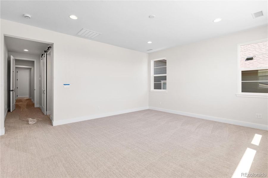 Spacious, unfurnished interior of a new home in Luxe at The Canyons, Castle Pines (Image 48).