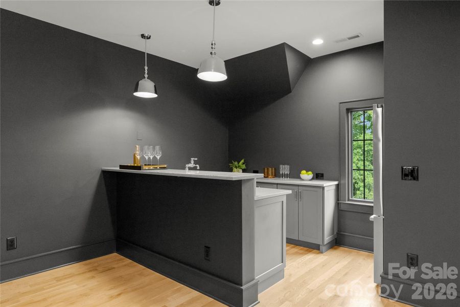 Wet bar & refrigerator for easy entertaining Wet bar & refrigerator for easy entertaining