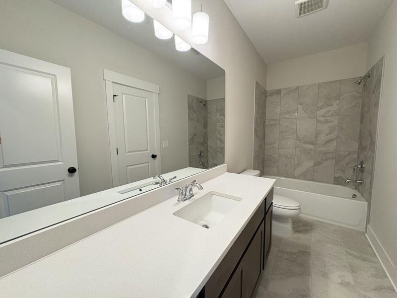 Furnished interior view inside a new home in Arden on Lanier, Cumming (Image 4).