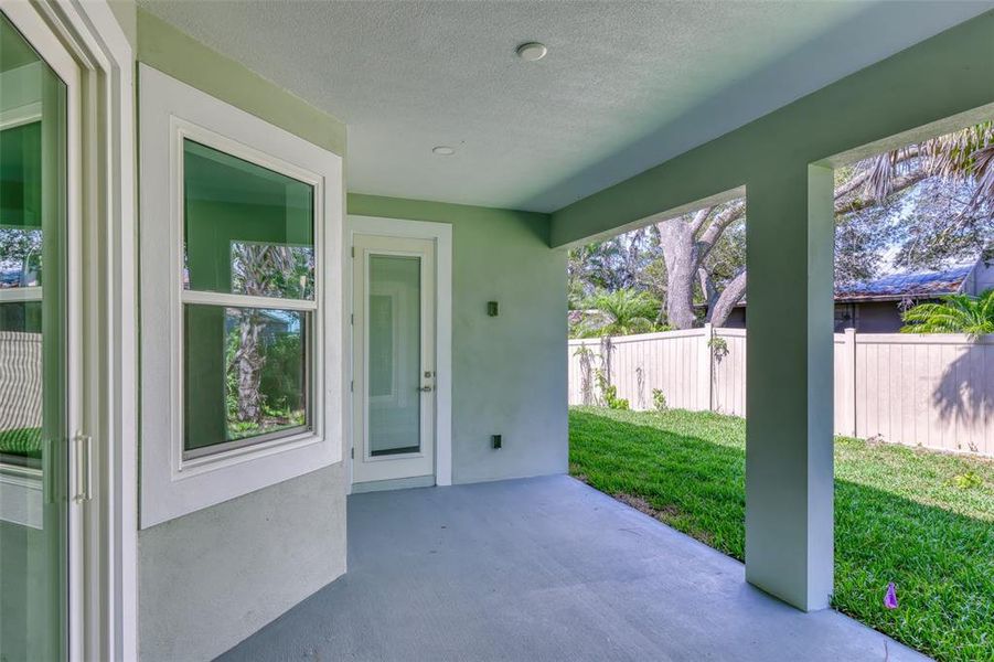 Exterior details and patio area of a home in , New Smyrna Beach (Image 3).