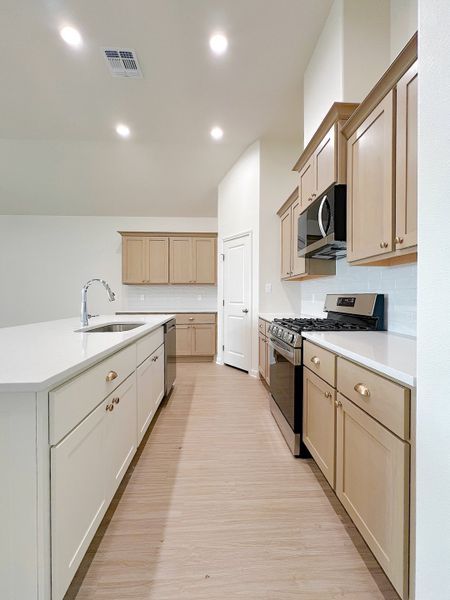 Furnished interior view inside a new home in TerraVista, Victoria (Image 4).