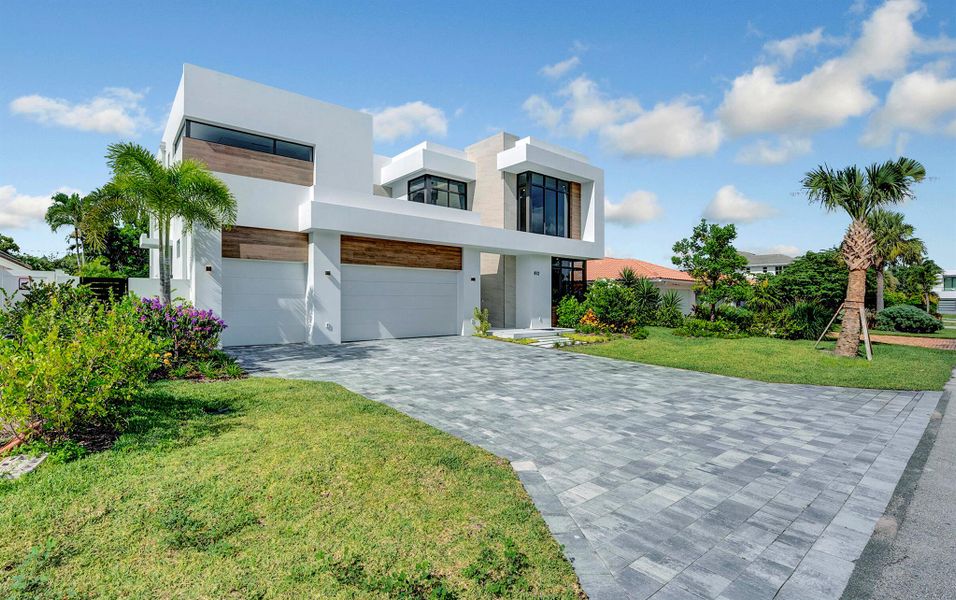 Front exterior of a new home in , Boca Raton, FL, highlighting curb appeal (Image 20). Front exterior of a new home in , Boca Raton, FL, highlighting curb appeal (Image 20).