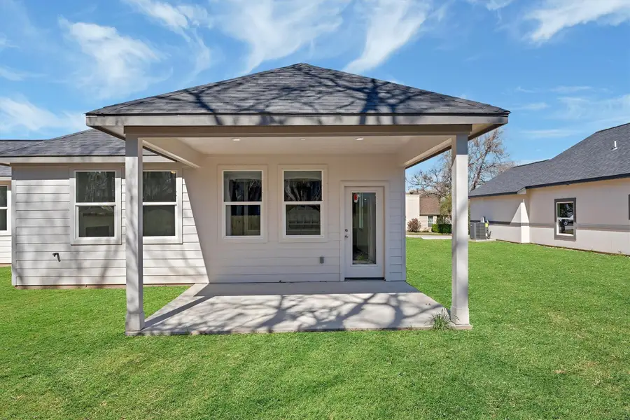 Front exterior of a new home in , Montgomery, TX, highlighting curb appeal (Image 1).