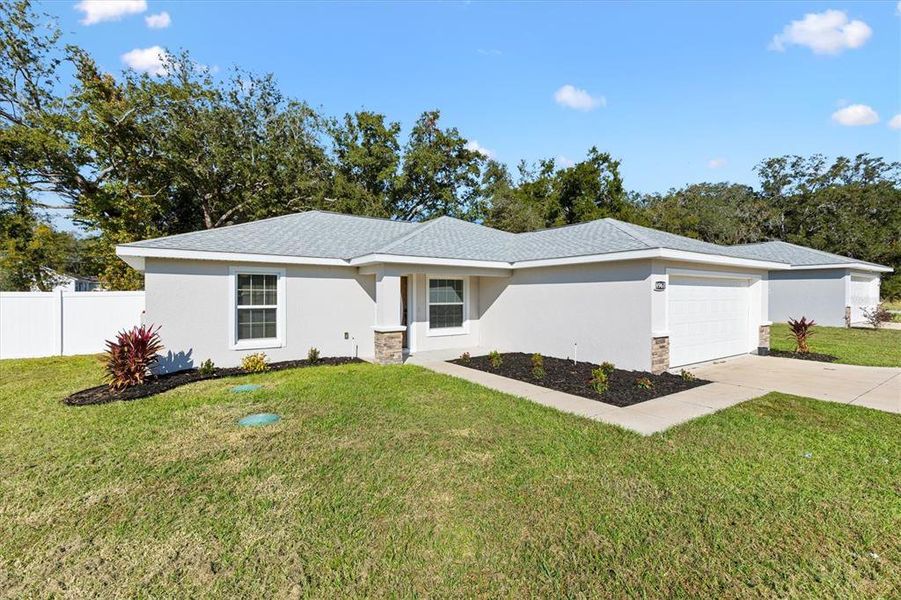 Exterior details and patio area of a home in , Summerfield (Image 25).