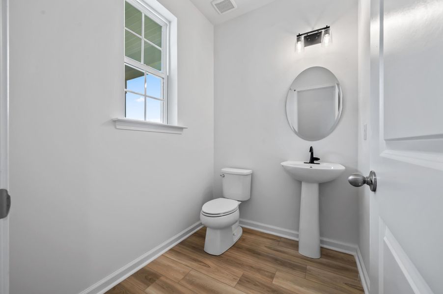 Furnished interior view inside a new home in Creekside at Andrews, Summerville (Image 9). Furnished interior view inside a new home in Creekside at Andrews, Summerville (Image 9).