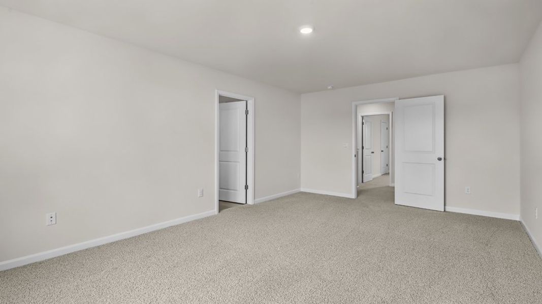 Spacious, unfurnished interior of a new home in The Reserve at Prestleigh, Wake Forest (Image 16).