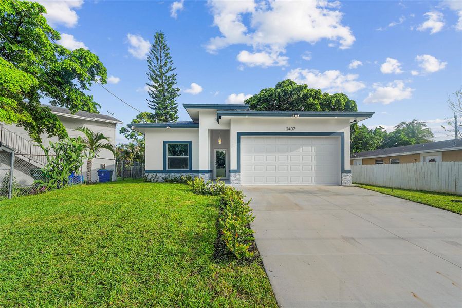 Front exterior of a new home in , Fort Lauderdale, FL, highlighting curb appeal (Image 1). Front exterior of a new home in , Fort Lauderdale, FL, highlighting curb appeal (Image 1).