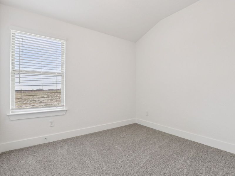 Living room in the Callaghan floorplan at a Meritage Homes community.