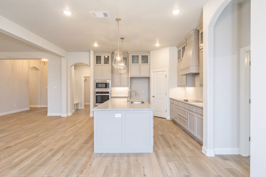 Representative furnished interior of a home built from the The Hudson by Doug Parr Custom Homes in Monarch Manor, Poolville (Image 7).