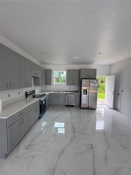 Furnished interior view inside a new home in , Winter Garden (Image 4).