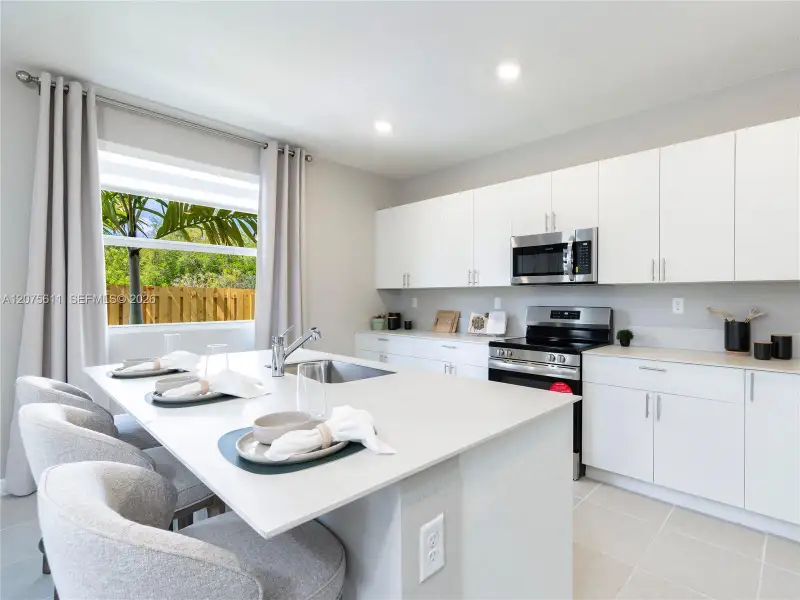 Furnished interior view inside a new home in Wildwood Groves, Miami (Image 9).