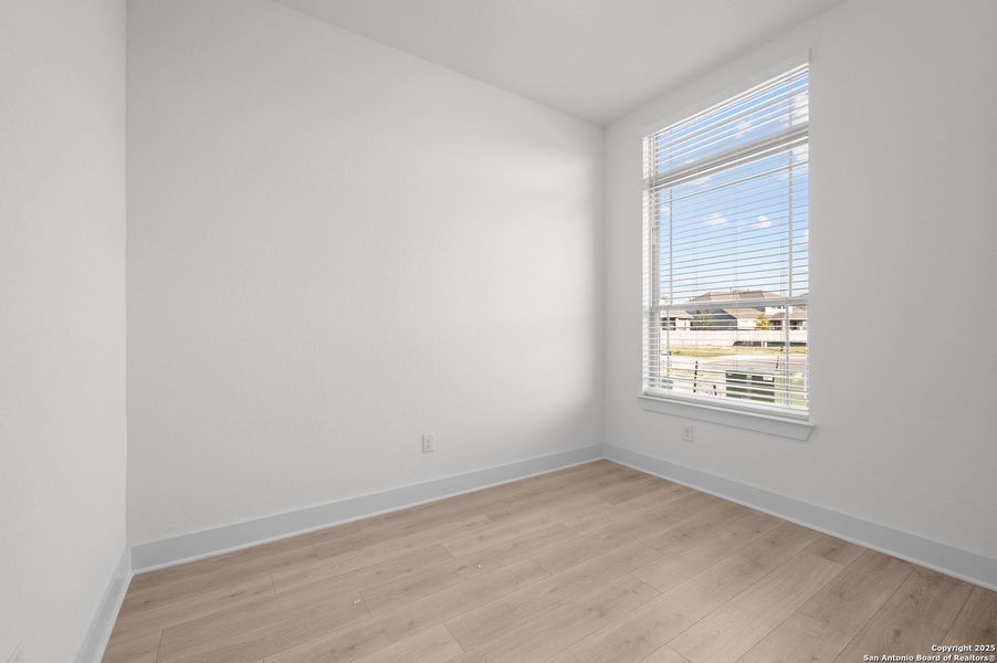 Spacious, unfurnished interior of a new home in Stillwater Ranch, San Antonio (Image 32).
