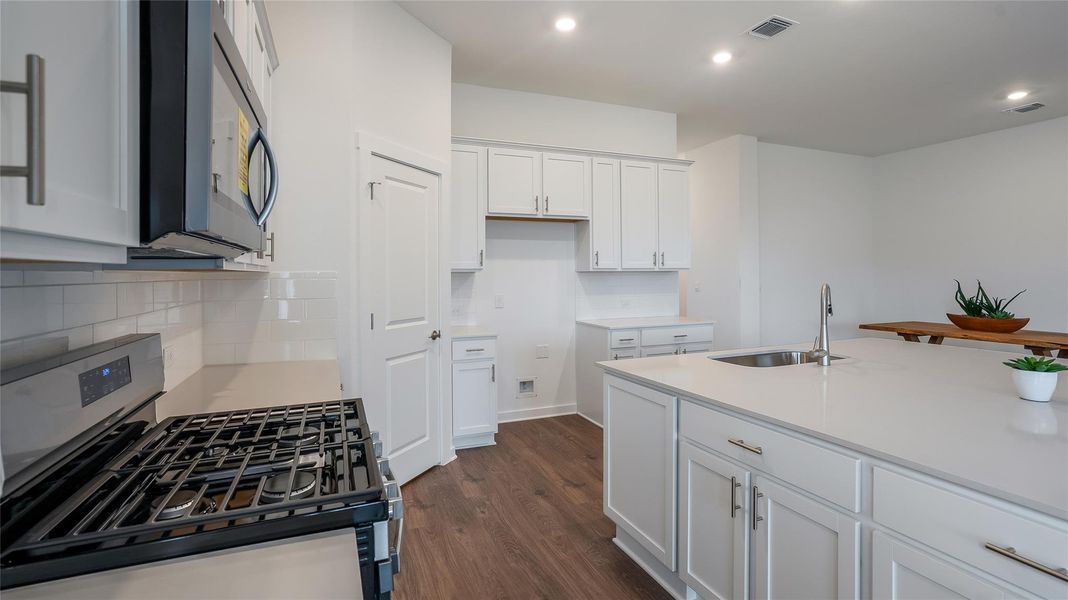 Furnished interior view inside a new home in Rosenbusch Ranch, Leander (Image 13). Furnished interior view inside a new home in Rosenbusch Ranch, Leander (Image 13).