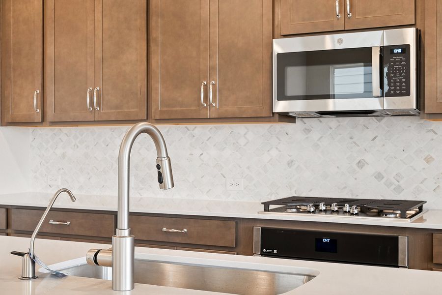 Image 55 representing the Blake by Ashton Woods in Rolling Glen, Hutto, TX.