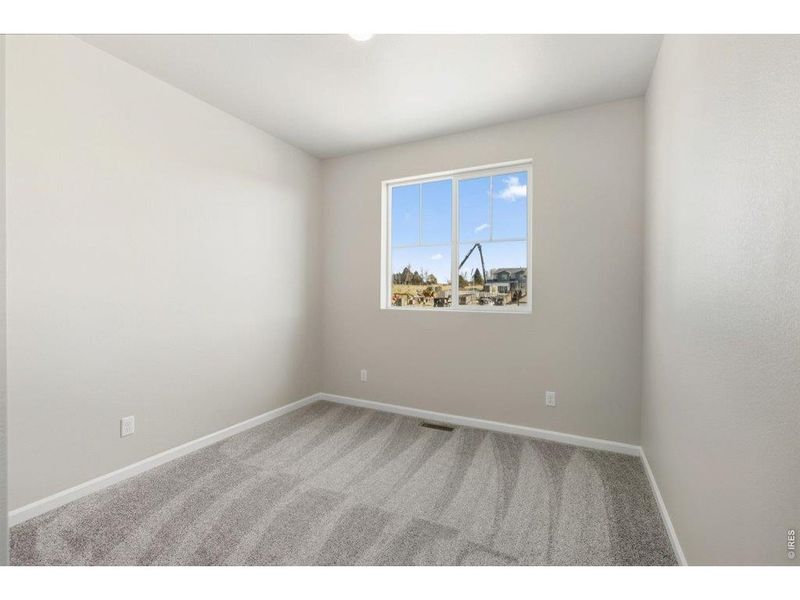Spacious, unfurnished interior of a new home in Highlands Preserve, Mead (Image 14).