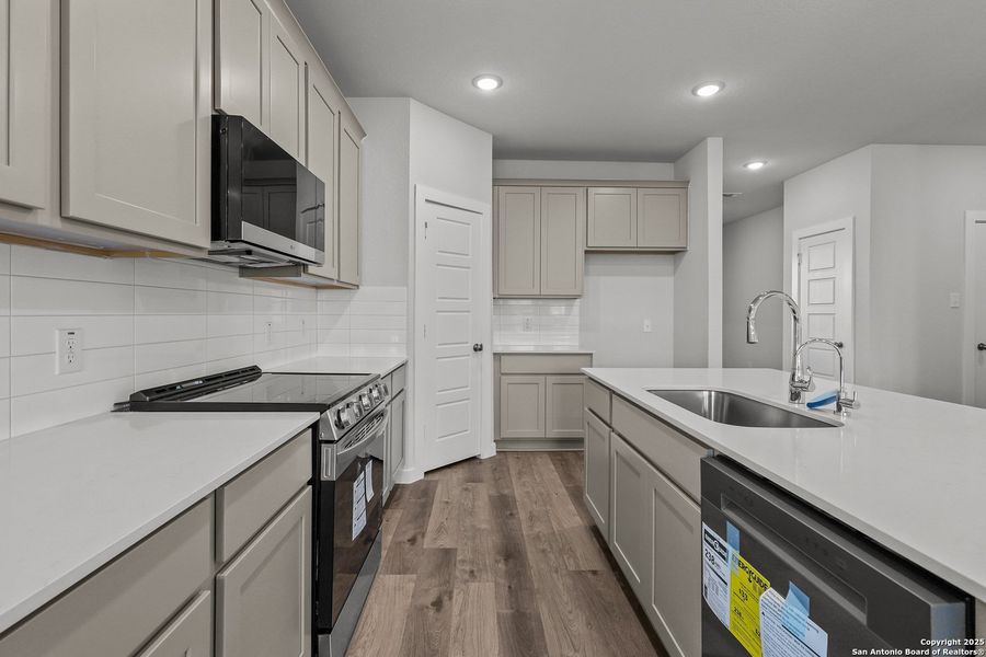 Furnished interior view inside a new home in Cinco Lakes, San Antonio (Image 7).