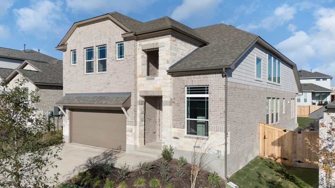 Front exterior of a new home in Nolina, Georgetown, TX, highlighting curb appeal (Image 17).