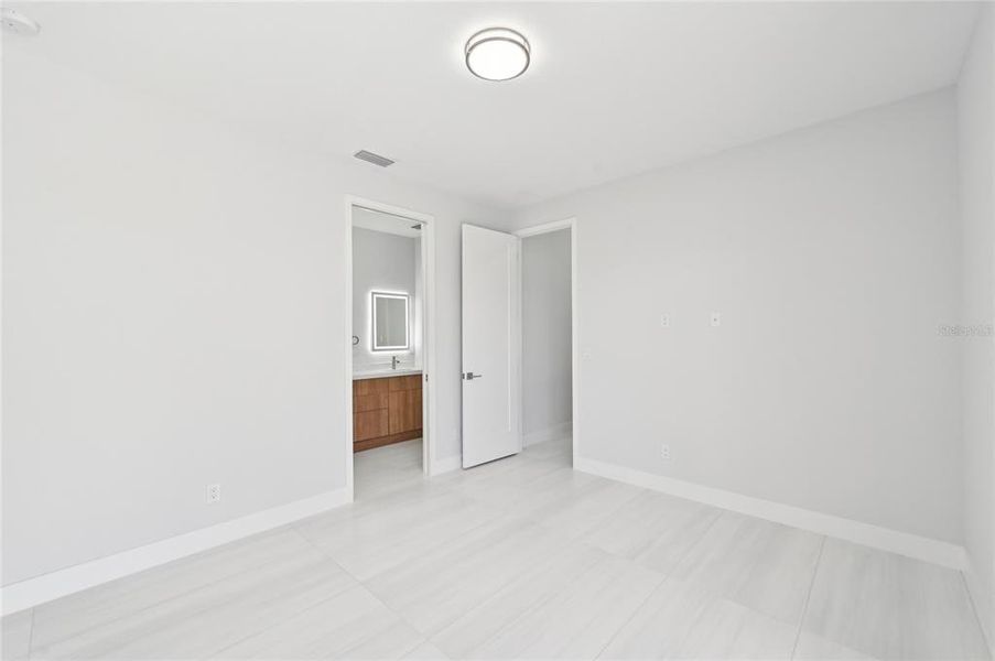 Spacious, unfurnished interior of a new home in , Port Charlotte (Image 42).