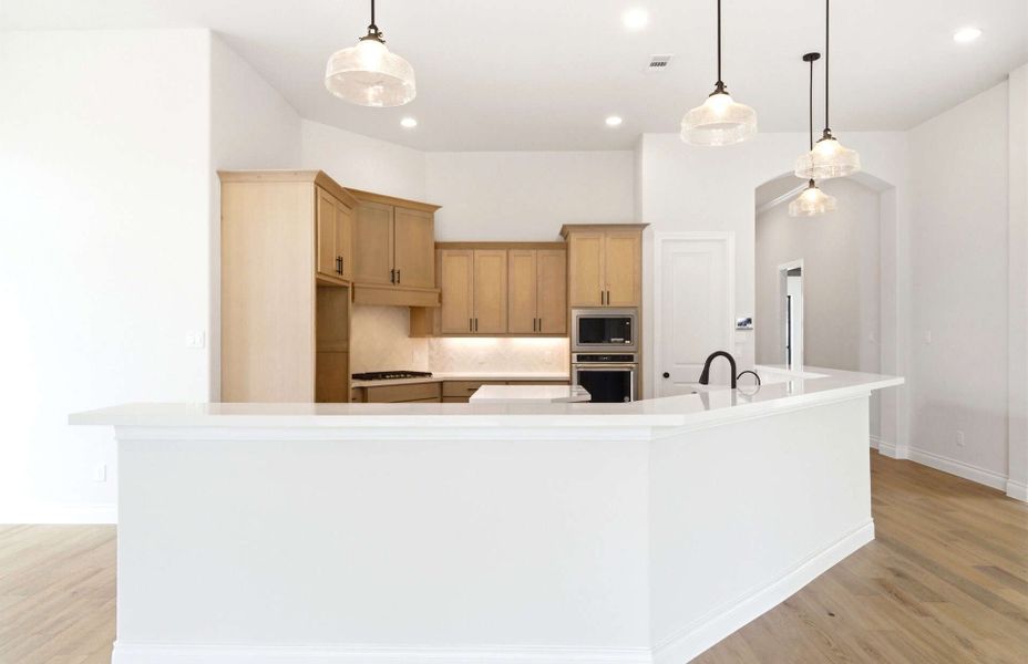 Furnished interior view inside a new home in The Highlands 55′, Porter (Image 12).