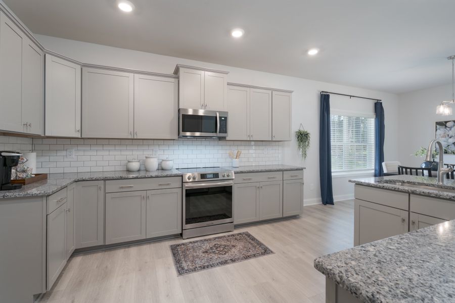 Representative furnished interior of a home built from the 3320 by Adams Homes in Norris Landing, Snellville (Image 17).