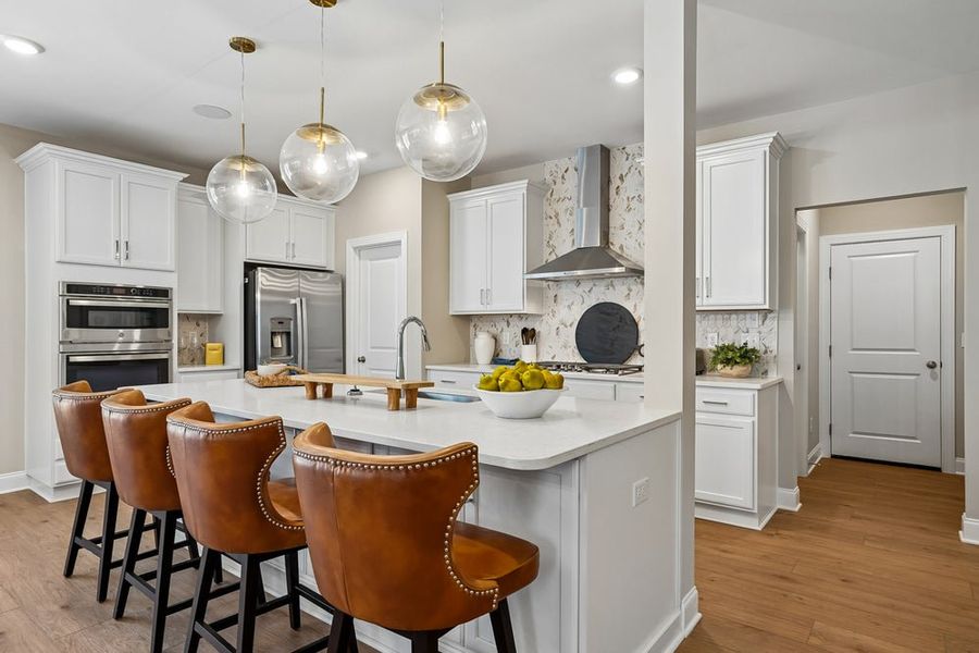 Representative furnished interior of a home built from the Roanoke by Caruso Homes in Magnolia Acres, Fuquay Varina (Image 5).