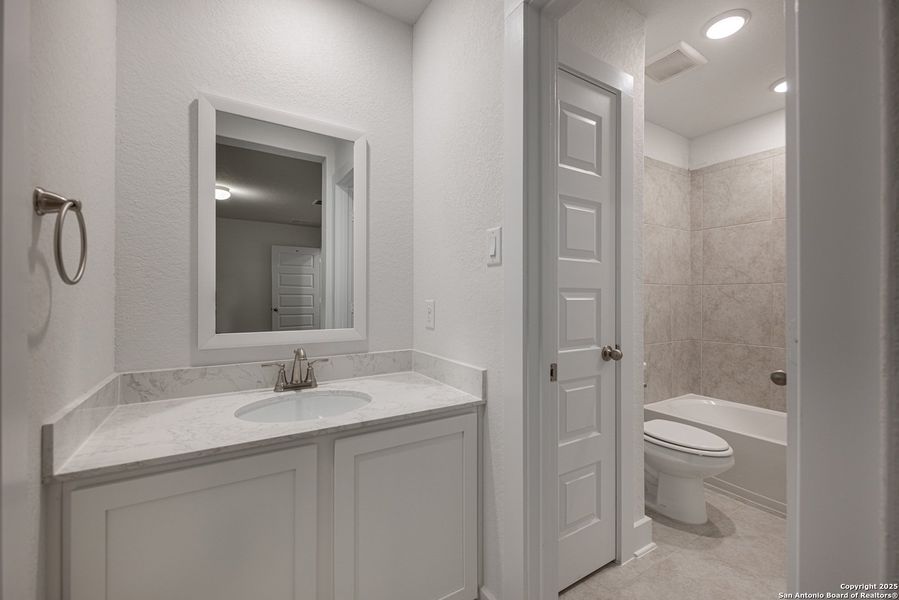 Furnished interior view inside a new home in Buffalo Crossing – New Phase Now Preselling, Cibolo (Image 9).