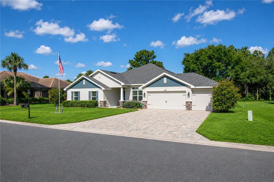 Front exterior of a new home in , Dunnellon, FL, highlighting curb appeal (Image 27).