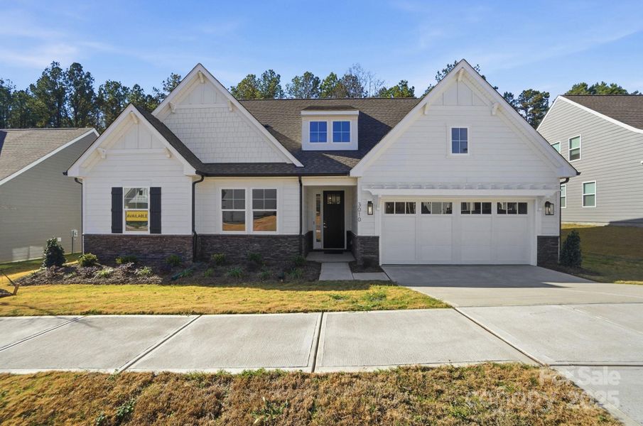 Front exterior of a new home in Rone Creek, Waxhaw, NC, highlighting curb appeal (Image 1).