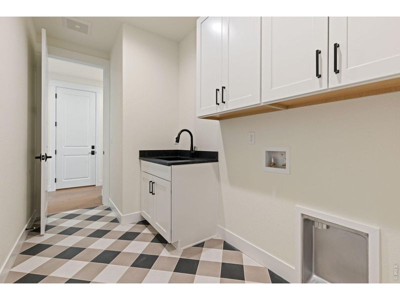 Furnished interior view inside a new home in RainDance, Windsor (Image 17).
