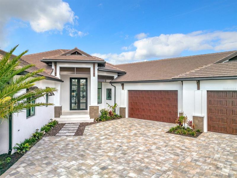 Front exterior of a new home in , Fort Myers, FL, highlighting curb appeal (Image 27).