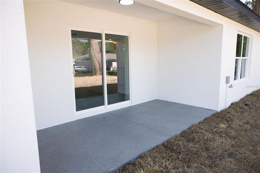Exterior details and patio area of a home in , Ocala (Image 3).