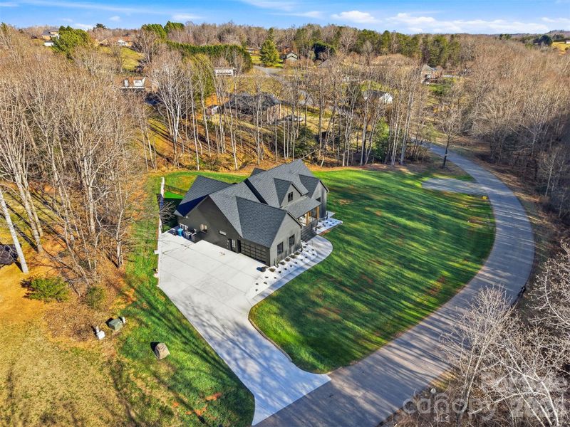 Front exterior of a new home in , Hickory, NC, highlighting curb appeal (Image 22).
