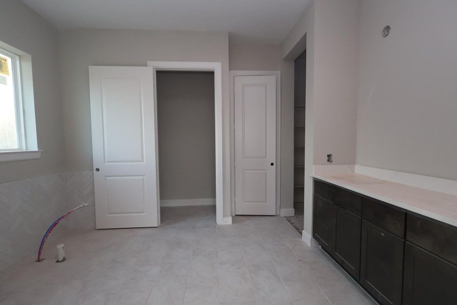 In-progress construction of a new home in The Highlands Encore - Harbor Collection, Porter, TX (Image 9).