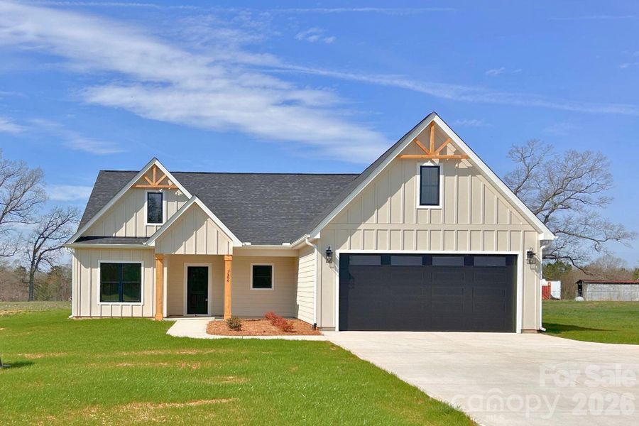 Front exterior of a new home in , Crouse, NC, highlighting curb appeal (Image 21). Front exterior of a new home in , Crouse, NC, highlighting curb appeal (Image 21).