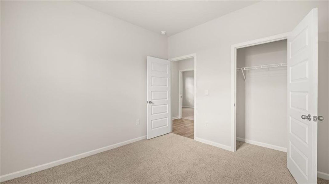 Spacious, unfurnished interior of a new home in Brooks Station, Dacula (Image 18).