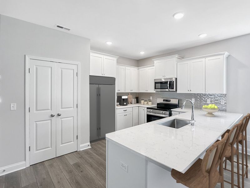 Representative furnished interior of a home built from the Laurel by Stevens Fine Homes in Parkwood Estates, Leland (Image 22).