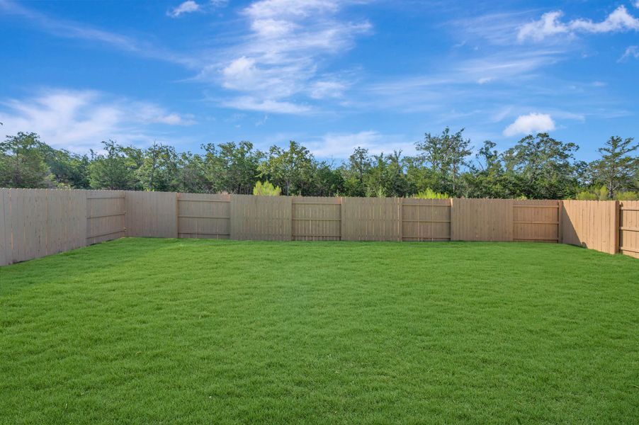Exterior details and patio area of a home in The Colony, Bastrop (Image 4).
