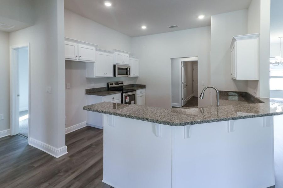 Furnished interior view inside a new home in Pecan Valley, Cantonment (Image 4). Furnished interior view inside a new home in Pecan Valley, Cantonment (Image 4).