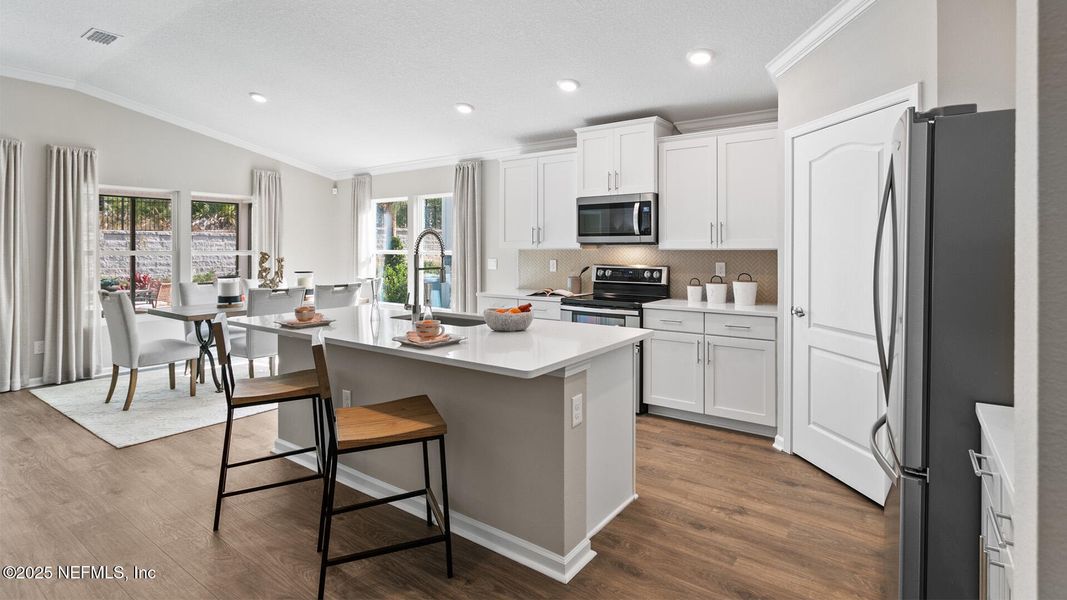 Furnished interior view inside a new home in Sawmill Branch, Palm Coast (Image 10).
