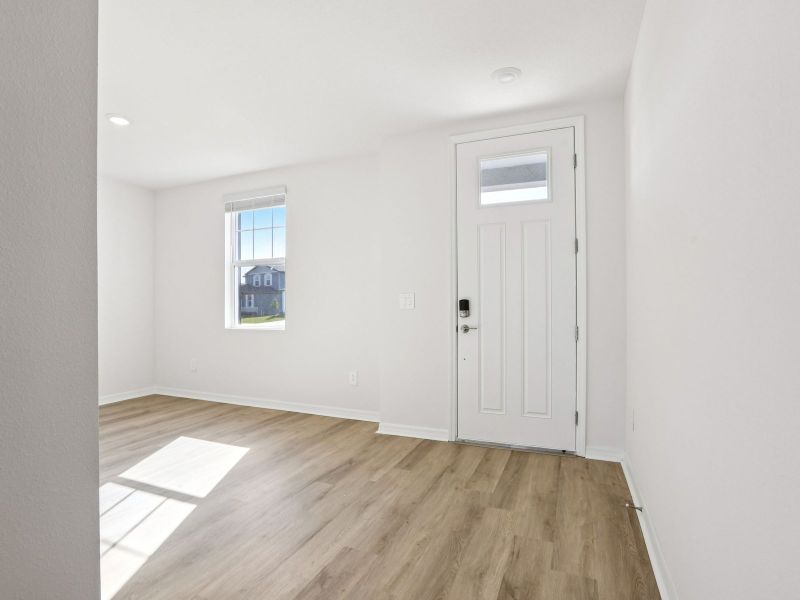 Spacious, unfurnished interior of a new home in The Grove at Stuart Crossing - Classic Series, Bartow (Image 14).
