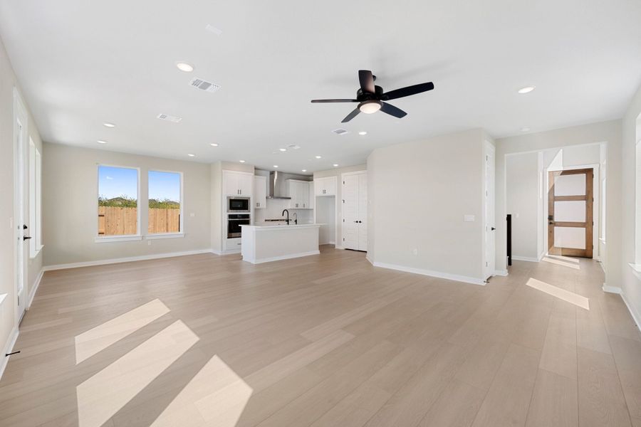 Spacious, unfurnished interior of a new home in Terrace Collection At Turner's Crossing, Buda (Image 21).