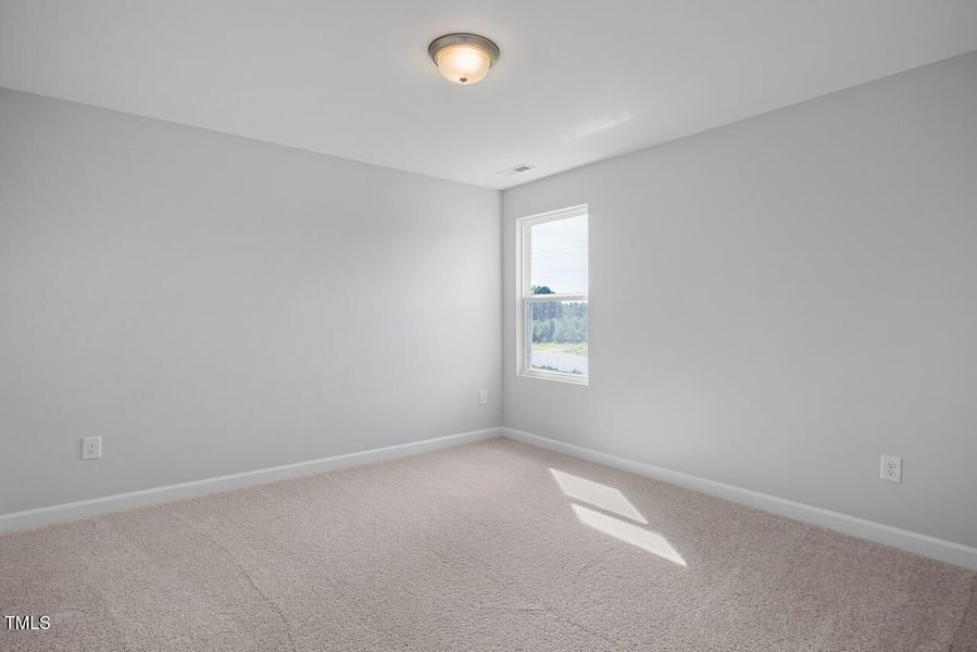 Spacious, unfurnished interior of a new home in Woodland Crossing, Zebulon (Image 24).