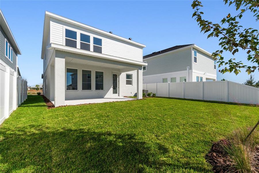 Exterior details and patio area of a home in Persimmon Park - Garden Series, Wesley Chapel (Image 20).