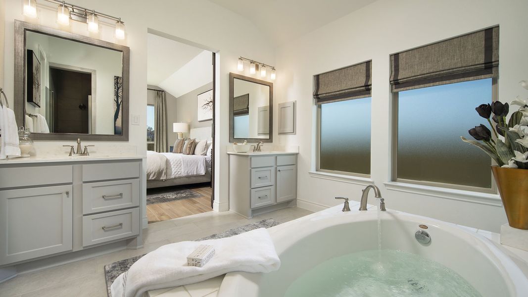 Representative furnished interior of a home built from the 2935M by Perry Homes in Lakes of Cane Island, Katy (Image 13).