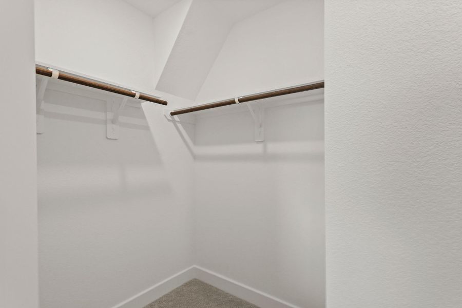 Primary suite walk-in closet (*Photo not of actual home and used for illustration purposes only.)