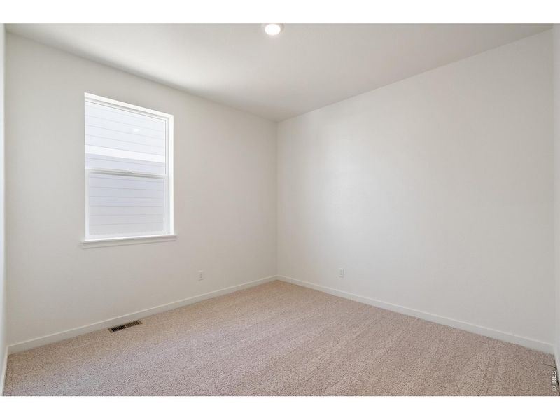 Spacious, unfurnished interior of a new home in Westgate, Greeley (Image 21).