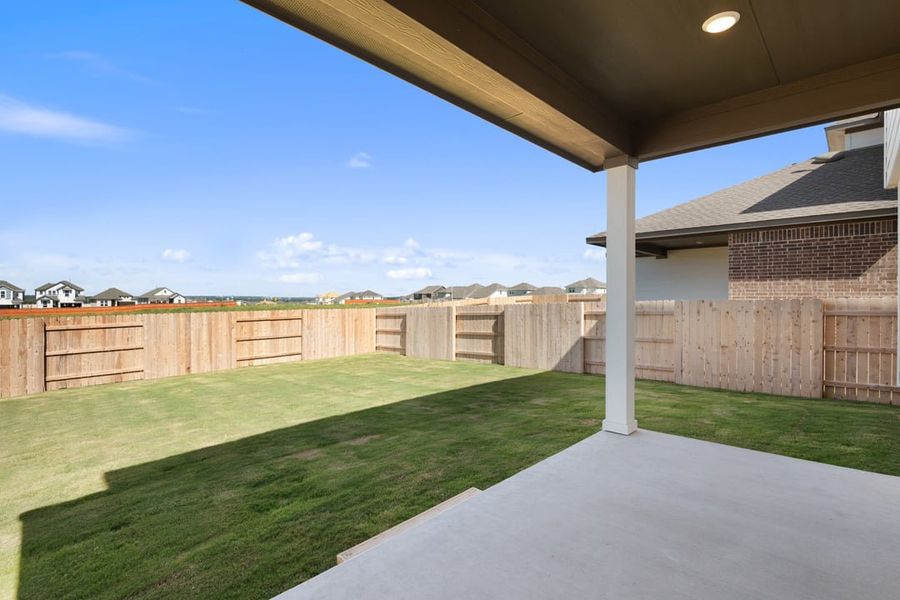 Exterior details and patio area of a home in Terrace Collection at Lariat, Liberty Hill (Image 4).