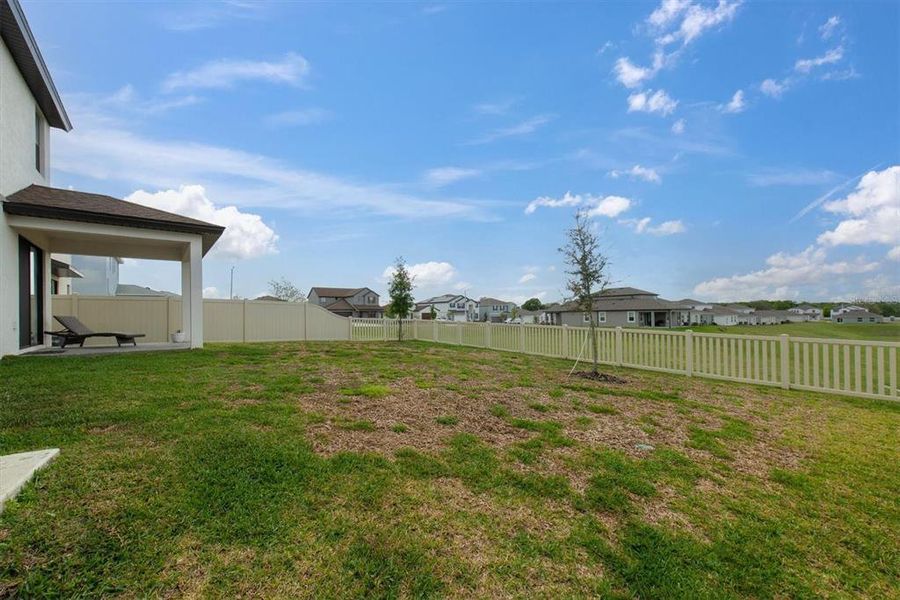 Exterior details and patio area of a home in Hilltop Point, Dade City (Image 27).