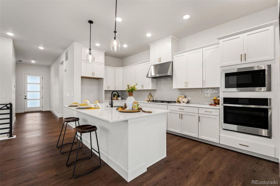 Furnished interior view inside a new home in Wolf Ranch - Enclave Collection, Colorado Springs (Image 9).